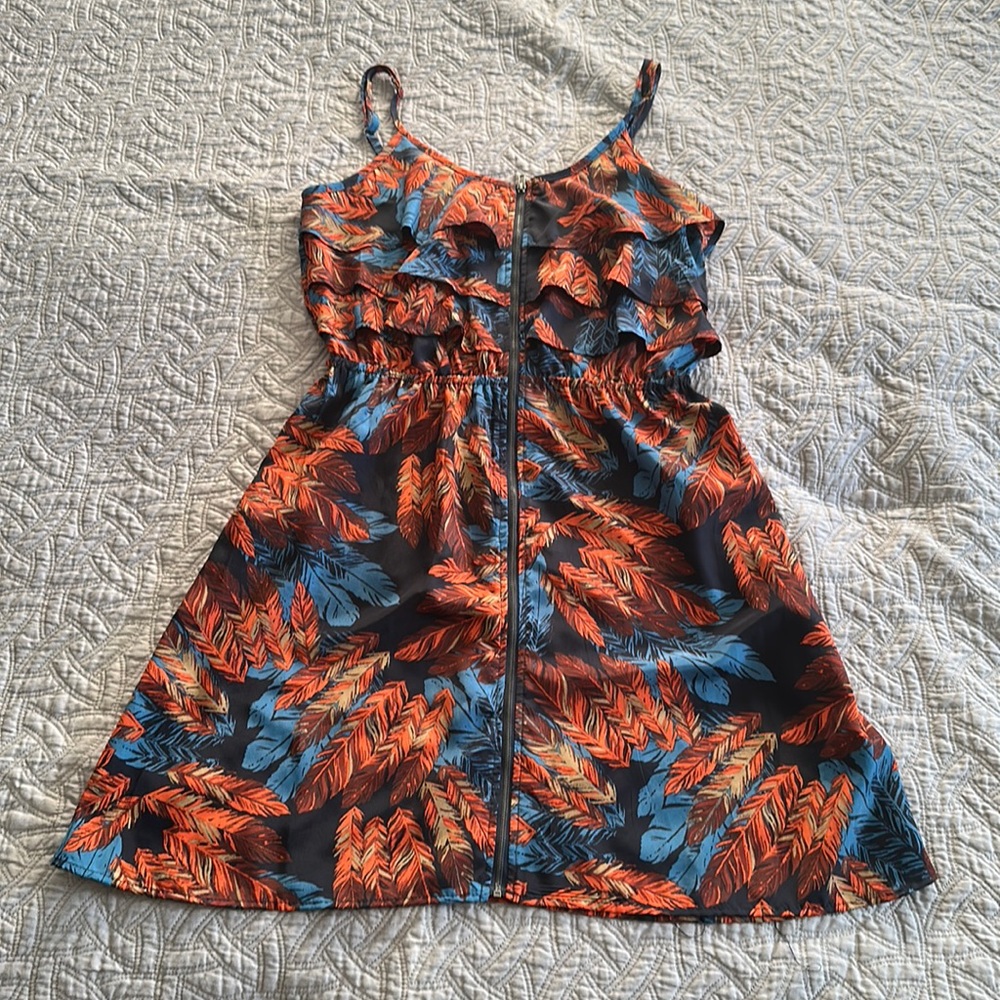 Xhilaration Size Medium Zipper front dress with feather pattern